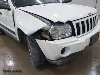 2006 Jeep Grand Cherokee Laredo with VIN 1J8GR48K06C163877, listed as a IAAI auction lot 41971240 with 250,544 mi miles. Bid and sale history available at carsss.com. Image 6.