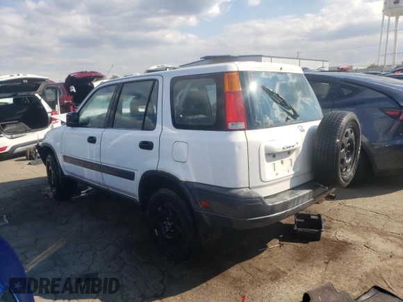 2000 Honda CR-V LX with VIN JHLRD184XYC024506, listed as a Copart auction lot 73128634 with 138,087 mi miles and Salvage Title. Bid and sale history available at carsss.com. Image 2.