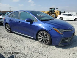 2022 Toyota Corolla SE with VIN 5YFS4MCE8NP106186, listed as a Copart auction lot 50429145 with 54,889 mi miles and Salvage Title. Bid and sale history available at carsss.com. Image 4.
