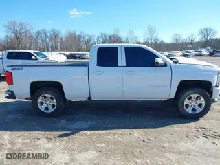 2018 Chevrolet Silverado 1500 LT with VIN 1GCVKREC5JZ350034, listed as a IAAI auction lot 41649277 with 112,673 mi miles. Bid and sale history available at carsss.com. Image 13.