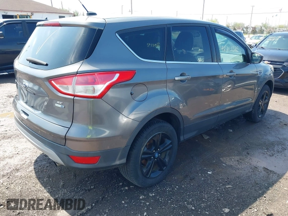 2013 Ford Escape SE with VIN 1FMCU9GX0DUA52263, listed as a IAAI auction lot 42211395 with 140,067 mi miles and . Bid and sale history available at DreamBid. Image 4.