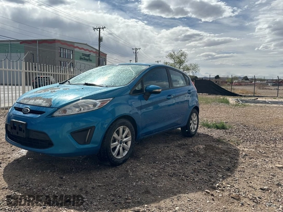 2013 Ford Fiesta SE with VIN 3FADP4EJ0DM141097, listed as a Copart auction lot 51342175 with 146,316 mi miles and Clean Title. Bid and sale history available at carsss.com. Image 2.