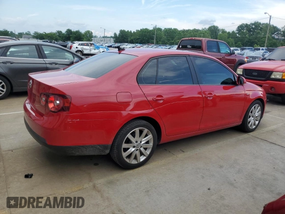 2010 Volkswagen Jetta Wolfsburg Edition with VIN 3VWRJ7AJXAM154666, listed as a Copart auction lot 60556875 with 149,509 mi miles and Salvage title. Bid and sale history available at DreamBid. Image 3.