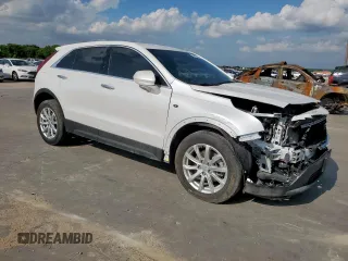 2021 Cadillac XT4 FWD Luxury z VIN 1GYAZAR49MF084676, wystawiony jako Copart lot #59765515 z przebiegiem 32 480 mil mil oraz Czysty tytuł • Clean title. Historia ofert i sprzedaży dostępna na DreamBid. Obrazek 4.