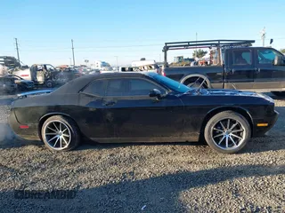 2013 Dodge Challenger R/T z VIN 2C3CDYBT1DH501055, wystawiony jako IAAI lot #41424579 z przebiegiem 156 492 mil mil oraz . Historia ofert i sprzedaży dostępna na DreamBid. Obrazek 13.