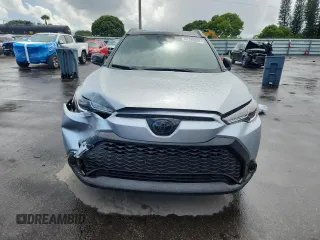 2024 Toyota Corolla Cross Hybrid S with VIN 7MUFBABG3RV047740, listed as a Copart auction lot 62395955 with 15,885 mi miles and Salvage title. Bid and sale history available at DreamBid. Image 5.