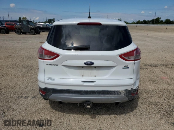 2013 Ford Escape SE with VIN 1FMCU9G96DUD66971, listed as a Copart auction lot 58507505 with 135,866 mi miles and Salvage title. Bid and sale history available at DreamBid. Image 6.