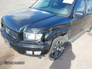 2013 Honda Ridgeline Sport with VIN 5FPYK1F70DB011814, listed as a IAAI auction lot 41689579 with 136,251 mi miles and . Bid and sale history available at DreamBid. Image 6.