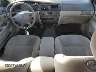 2002 Ford Taurus z VIN 1FAHP59S82A188995, wystawiony jako Copart lot #82141704 z przebiegiem 89 153 mil mil oraz Szkody całkowita. Historia ofert i sprzedaży dostępna na DreamBid. Obrazek 8.