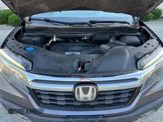2019 Honda Ridgeline RTL-E with VIN 5FPYK3F71KB009532, listed as a Copart auction lot 65827935 with 217,177 mi miles and Clean title. Bid and sale history available at DreamBid. Image 7.