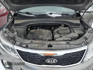 2014 Kia Sorento LX z VIN 5XYKT3A63EG470187, wystawiony jako Copart lot #88716075 z przebiegiem 111 478 mil mil oraz Szkoda całkowita • Salvage title. Historia ofert i sprzedaży dostępna na DreamBid. Obrazek 12.