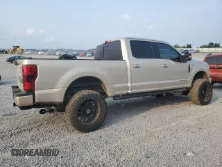 2017 Ford F-250 Lariat with VIN 1FT7W2BT0HEE63562, listed as a Copart auction lot 60880545 with 122,996 mi miles and Salvage title. Bid and sale history available at DreamBid. Image 3.