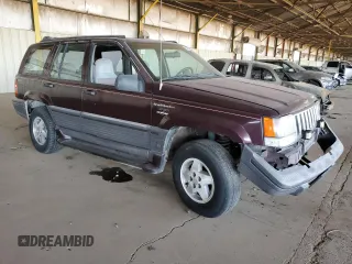1995 Jeep Grand Cherokee Laredo with VIN 1J4GZ58S1SC704775, listed as a Copart auction lot 87556535 with 266,365 mi miles and Salvage Title. Bid and sale history available at carsss.com. Image 4.
