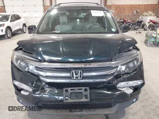 2016 Honda Pilot EX-L with VIN 5FNYF6H58GB045476, listed as a IAAI auction lot 42062966 with 102,290 mi miles. Bid and sale history available at carsss.com. Image 6.