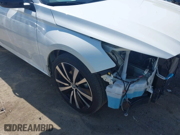 2022 Nissan Altima SR with VIN 1N4BL4CV6NN404337, listed as a IAAI auction lot 41856649 with 52,903 mi miles and . Bid and sale history available at DreamBid. Image 18.