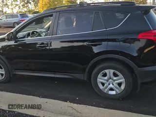 2014 Toyota RAV4 LE z VIN JTMBFREV9EJ001620, wystawiony jako Copart lot #80218235 z przebiegiem 158 261 mil mil oraz Czysty tytuł • Clean title. Historia ofert i sprzedaży dostępna na DreamBid. Obrazek 11.