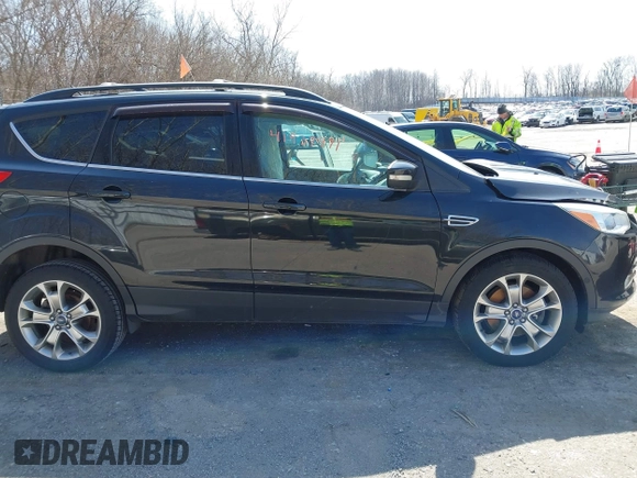 2013 Ford Escape SEL with VIN 1FMCU9H9XDUA01207, listed as a IAAI auction lot 41937971 with Not provided miles and . Bid and sale history available at DreamBid. Image 13.