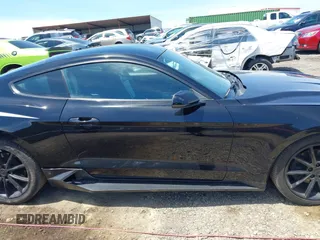 2019 Ford Mustang EcoBoost with VIN 1FA6P8TH4K5159573, listed as a IAAI auction lot 42207962 with 121,225 mi miles and . Bid and sale history available at DreamBid. Image 13.