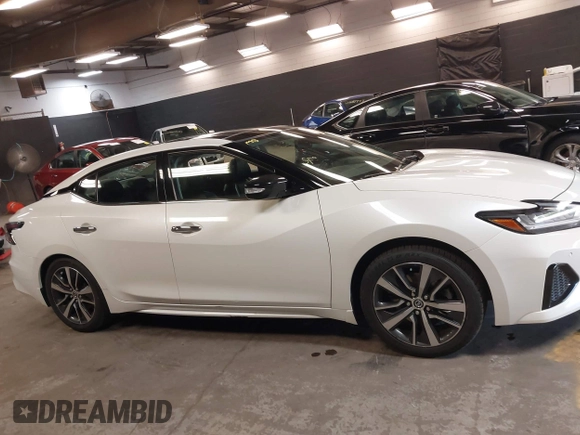 2020 Nissan Maxima SL z VIN 1N4AA6DV3LC370040, wystawiony jako IAAI lot #42437358 z przebiegiem 51 711 mil mil oraz . Historia ofert i sprzedaży dostępna na DreamBid. Obrazek 13.