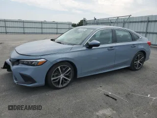 2024 Honda Civic Touring with VIN 2HGFE1F99RH307264, listed as a Copart auction lot 59689635 with 29,040 mi miles and Salvage title. Bid and sale history available at DreamBid. Image 1.