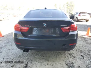 2015 BMW 4 Series 428i xDrive с VIN WBA4A7C52FD414569, выставлен на аукционе Copart как лот 55666205 с пробегом 63 773 миль миль и Списание • Salvage title. История ставок и продаж доступна на DreamBid. Изображение 6.