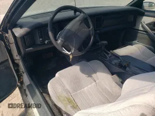 1991 Pontiac Firebird z VIN 1G2FS23E5ML239639, wystawiony jako Copart lot #54986095 z przebiegiem 154 017 mil mil oraz Tytuł czysty. Historia ofert i sprzedaży dostępna na DreamBid. Obrazek 8.