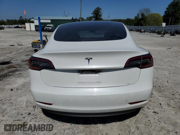 2023 Tesla Model 3 with VIN 5YJ3E1EA9PF558088, listed as a Copart auction lot 52228465 with 63,204 mi miles and Salvage title. Bid and sale history available at DreamBid. Image 6.