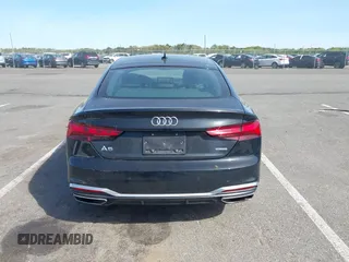 2023 Audi A5 Sportback S line Premium Plus z VIN WAUFACF52PA015824, wystawiony jako IAAI lot #42151635 z przebiegiem 24 509 mil mil oraz . Historia ofert i sprzedaży dostępna na DreamBid. Obrazek 16.