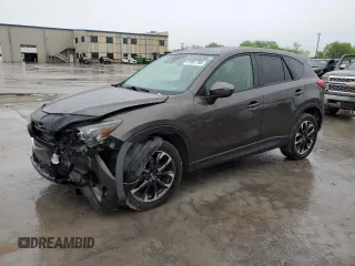 2016 Mazda CX-5 Grand Touring with VIN JM3KE2DY4G0811386, listed as a Copart auction lot 51961795 with 99,525 mi miles and Salvage Title. Bid and sale history available at carsss.com. Image 1.