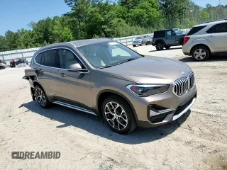 2020 BMW X1 xDrive28i z VIN WBXJG9C09L5R23653, wystawiony jako Copart lot #52771535 z przebiegiem 54 550 mil mil oraz Szkoda całkowita • Salvage title. Historia ofert i sprzedaży dostępna na DreamBid. Obrazek 12.