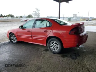 2001 Pontiac Grand Am SE1 with VIN 1G2NF52EX1C242261, listed as a Copart auction lot 82236874 with 184,935 mi miles and Salvage Title. Bid and sale history available at carsss.com. Image 2.