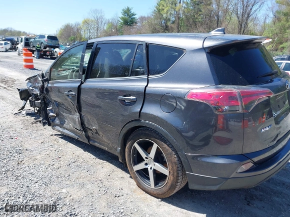 2018 Toyota RAV4 LE with VIN JTMBFREV0JJ722483, listed as a IAAI auction lot 41982973 with 83,012 mi miles. Bid and sale history available at carsss.com. Image 3.