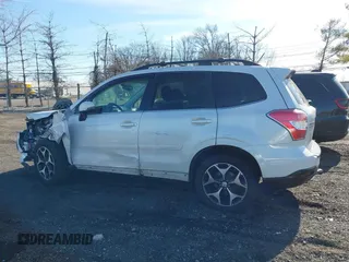 2014 Subaru Forester XT Touring with VIN JF2SJGMC4EH534647, listed as a IAAI auction lot 41828950 with 106,375 mi miles and . Bid and sale history available at DreamBid. Image 14.
