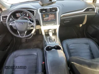 2015 Ford Fusion SE Hybrid with VIN 3FA6P0LU7FR114130, listed as a Copart auction lot 52806105 with 119,542 mi miles and Salvage Title. Bid and sale history available at DreamBid. Image 8.