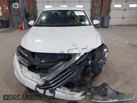 2019 Volkswagen Jetta S z VIN 3VWC57BU6KM129512, wystawiony jako IAAI lot #42205228 z przebiegiem 92 940 mil mil oraz . Historia ofert i sprzedaży dostępna na DreamBid. Obrazek 11.