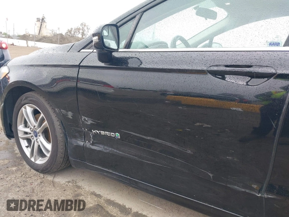 2016 Ford Fusion SE Hybrid with VIN 3FA6P0LU5GR356433, listed as a IAAI auction lot 41799204 with 157,670 mi miles. Bid and sale history available at carsss.com. Image 6.