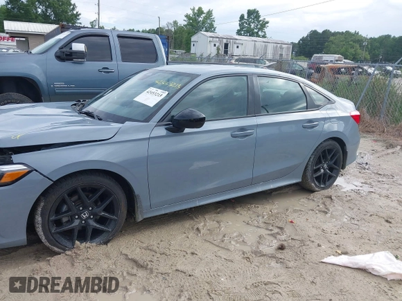 2023 Honda Civic Sport with VIN 2HGFE2F5XPH546709, listed as a IAAI auction lot 42453213 with 46,768 mi miles and . Bid and sale history available at DreamBid. Image 14.