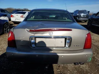 2003 Cadillac DeVille DHS with VIN 1G6KE57Y43U267581, listed as a Copart auction lot 81783904 with 0 mi miles and Salvage Title. Bid and sale history available at carsss.com. Image 6.