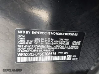 2025 BMW iX xDrive50 with VIN WB523CF04SCT06575, listed as a IAAI auction lot 41525744 with 732 mi miles. Bid and sale history available at carsss.com. Image 9.