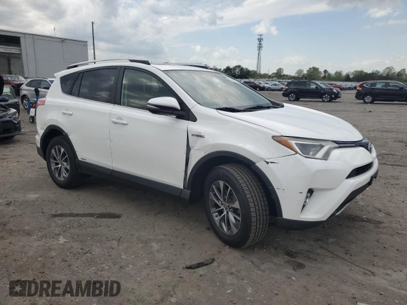 2016 Toyota RAV4 Hybrid XLE with VIN JTMRJREV0GD017557, listed as a Copart auction lot 53369355 with 271,066 mi miles and Salvage Title. Bid and sale history available at carsss.com. Image 4.