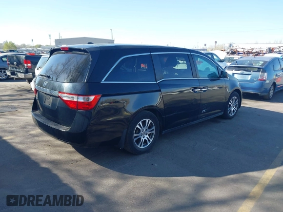 2012 Honda Odyssey EX-L with VIN 5FNRL5H68CB025481, listed as a IAAI auction lot 41979121 with Not Provided miles and . Bid and sale history available at DreamBid. Image 4.