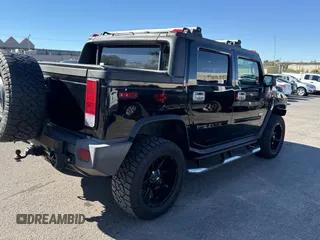 2005 Hummer H2 SUT with VIN 5GRGN22U35H113041, listed as a Copart auction lot 76730334 with 269,232 mi miles and Clean Title. Bid and sale history available at carsss.com. Image 4.