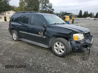 2003 GMC Envoy XL SLT with VIN 1GKES16S036191987, listed as a Copart auction lot 76776604 with 253,889 mi miles and Salvage Title. Bid and sale history available at carsss.com. Image 4.