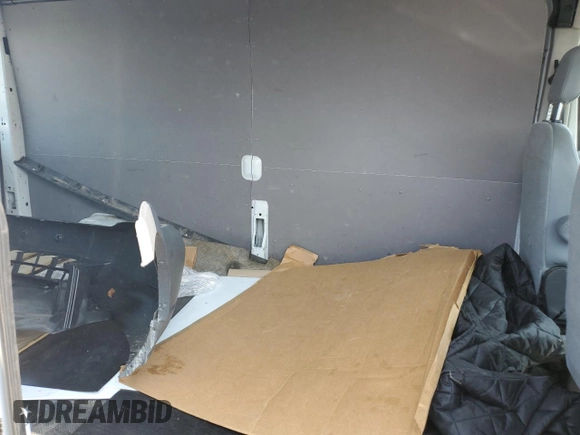 2016 Ford Transit Cargo z VIN 1FTYR2CM3GKB31134, wystawiony jako Copart lot #70293794 z przebiegiem 65 457 mil mil oraz Szkoda całkowita • Salvage title. Historia ofert i sprzedaży dostępna na DreamBid. Obrazek 11.