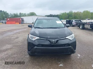 2018 Toyota RAV4 LE with VIN 2T3BFREV8JW777510, listed as a IAAI auction lot 41974675 with 62,795 mi miles. Bid and sale history available at carsss.com. Image 13.