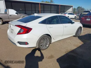 2021 Honda Civic Sedan EX-L with VIN 19XFC1F77ME006306, listed as a IAAI auction lot 41330566 with 120,092 mi miles. Bid and sale history available at carsss.com. Image 4.
