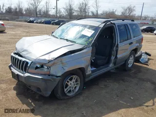 2002 Jeep Grand Cherokee Laredo with VIN 1J4GW48N42C188117, listed as a IAAI auction lot 41794232 with 1 mi miles. Bid and sale history available at carsss.com. Image 18.