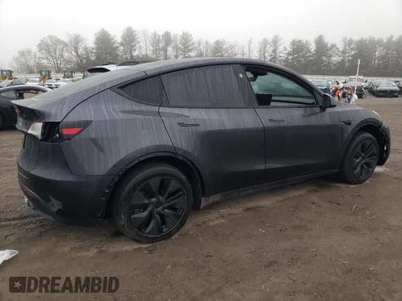 2025 Tesla Model Y Long Range z VIN 7SAYGDED9SF269767, wystawiony jako Copart lot #51588985 z przebiegiem 1 943 mil mil oraz Szkoda całkowita • Salvage title. Historia ofert i sprzedaży dostępna na DreamBid. Obrazek 3.