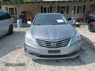 2015 Hyundai Azera Limited z VIN KMHFH4JG2FA483575, wystawiony jako IAAI lot #42422877 z przebiegiem 111 147 mil mil oraz . Historia ofert i sprzedaży dostępna na DreamBid. Obrazek 6.