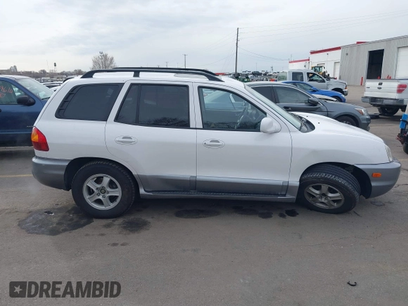 2004 Hyundai Santa Fe GLS with VIN KM8SC13DX4U609921, listed as a IAAI auction lot 41619492 with 113,592 mi miles. Bid and sale history available at carsss.com. Image 13.